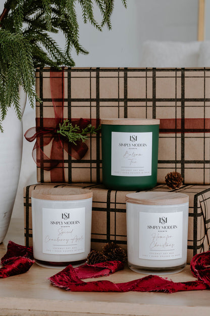 Holiday Candle Trio gift set — Balsam Fir in olive green, Spiced Cranberry Apple and Home for Christmas in white 12 oz vessels with plaid wrapped gifts